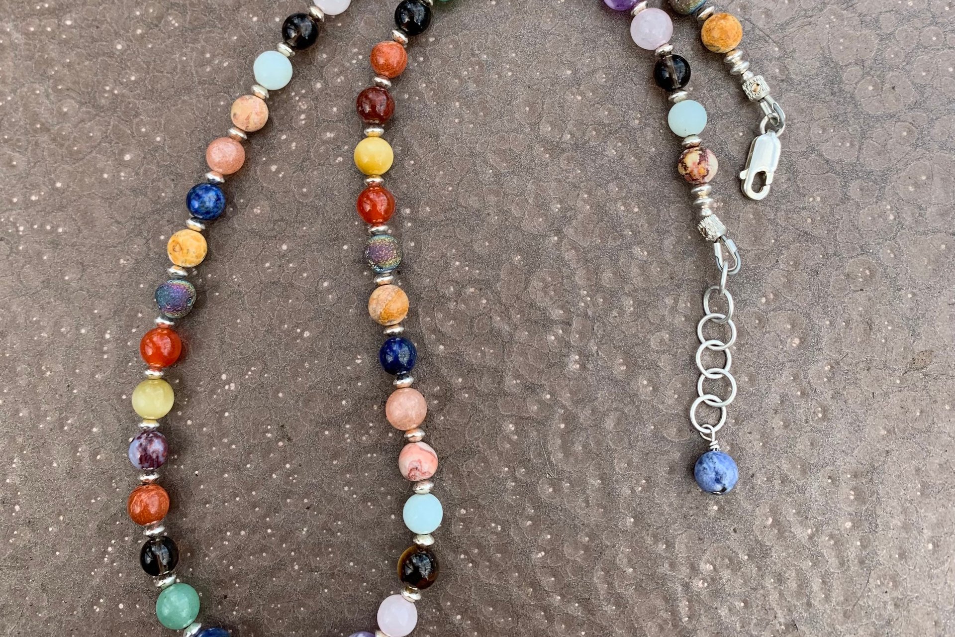 Multicolored Gemstone Necklace with Sterling Silver Beads.